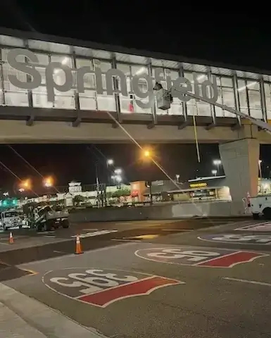 Springfield sign installation on pedestrian bridge